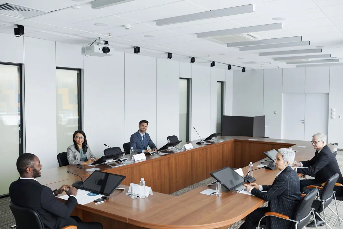 Multicultural executives in a leadership roundtable discussion